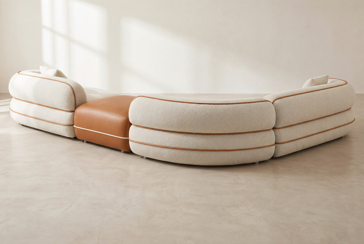 Anello corner sofa back view at an angle, rounded bouclé back
