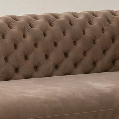 Close-up of the diamond tufted back and velvet seat cushion on the Palazzo sofa