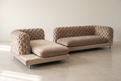 Palazzo tufted Chesterfield sofa and chaise in taupe velvet with Calacatta Gold marble side tables