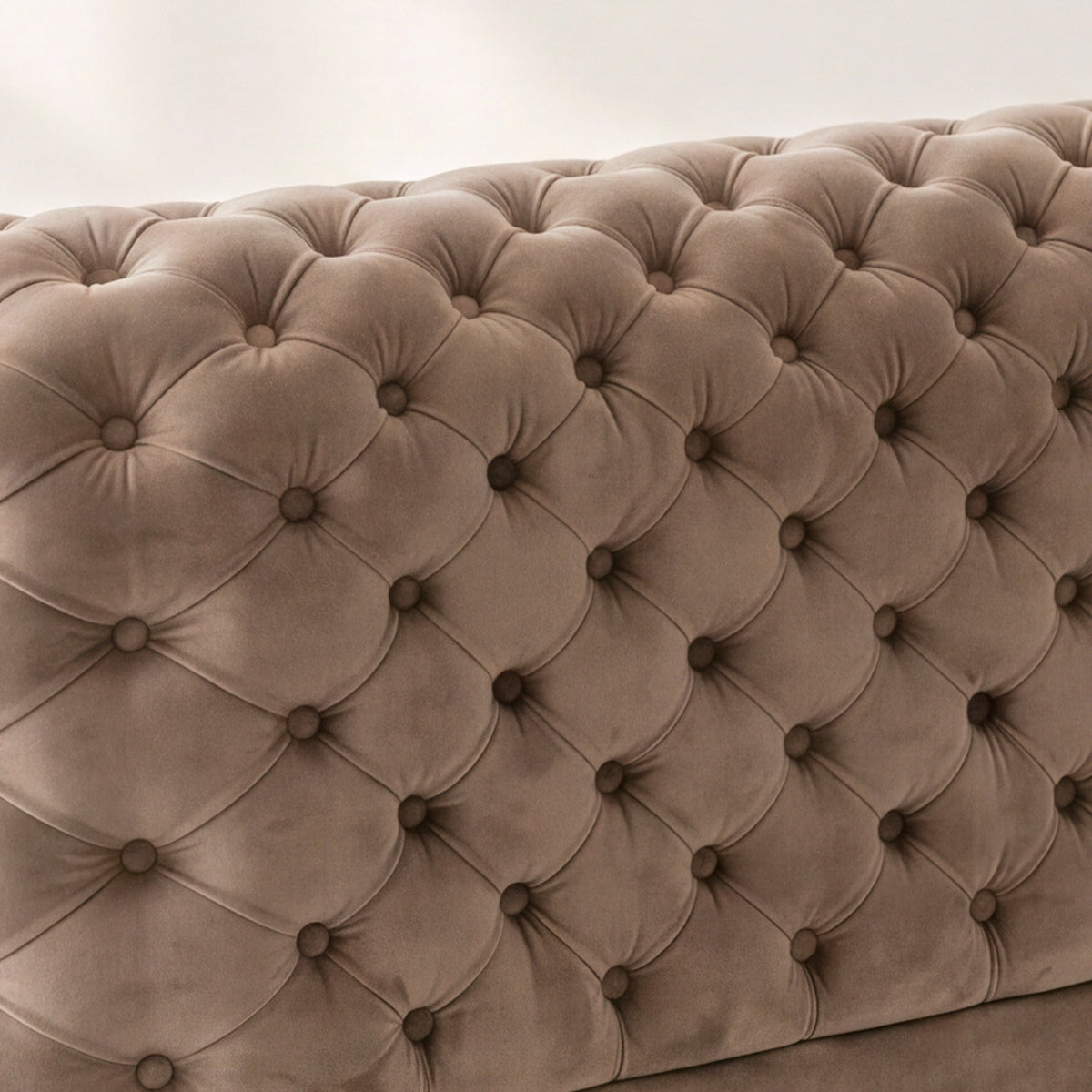 Close-up of the buttoned tufting on the back of the Palazzo sofa