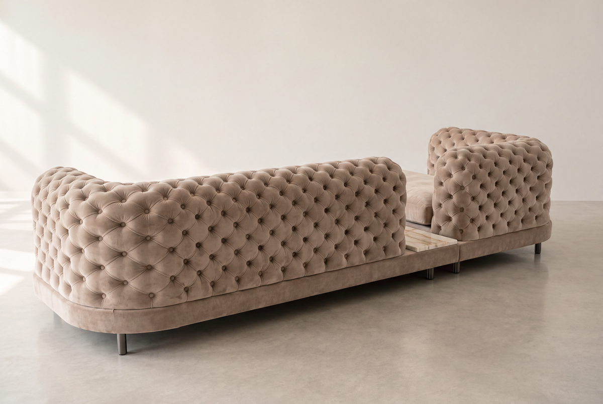 Palazzo sofa back view at an angle, fully tufted velvet back