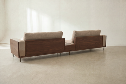 Cornice sofa back view at an angle, walnut-finish back panel