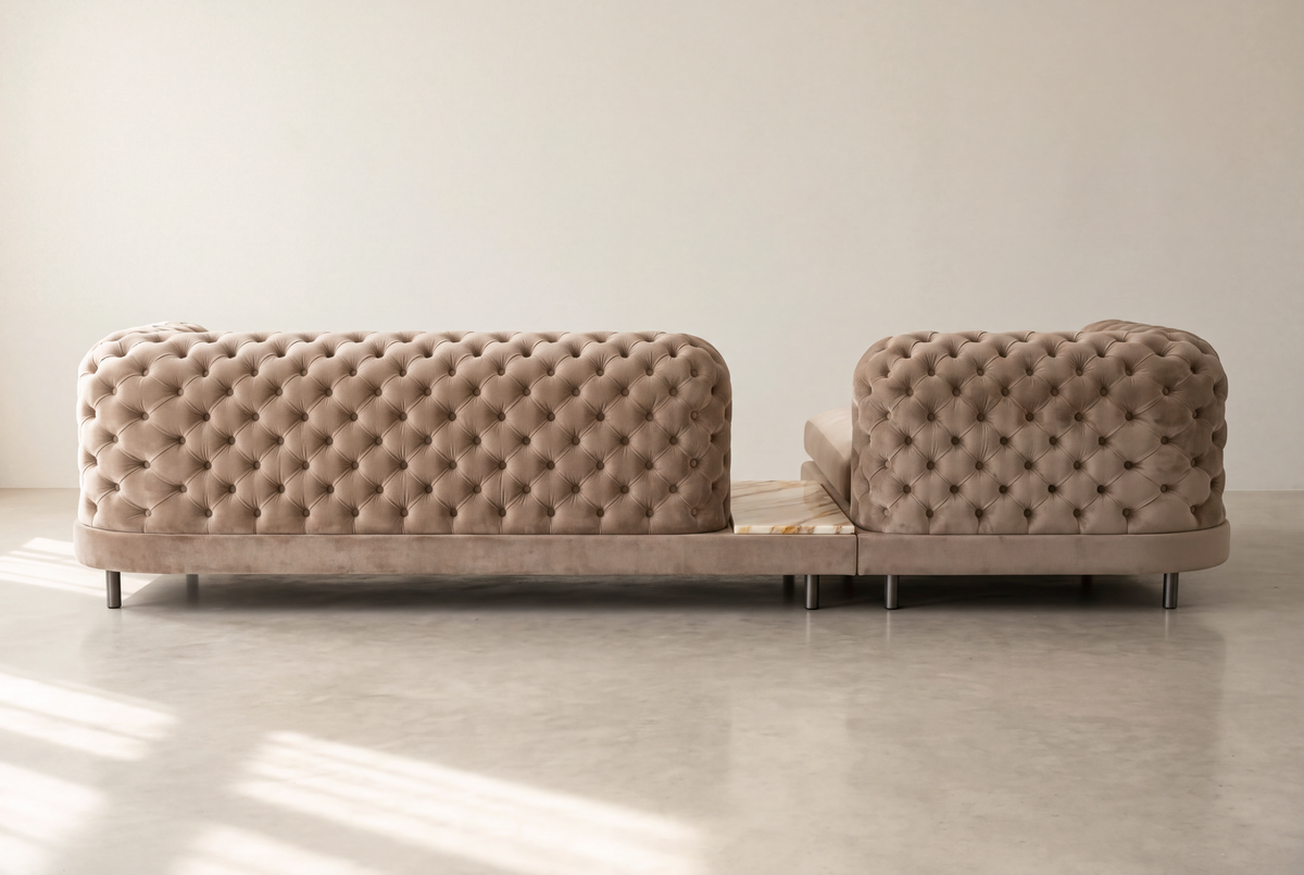 Palazzo sofa back view, tufted velvet backs and marble side table