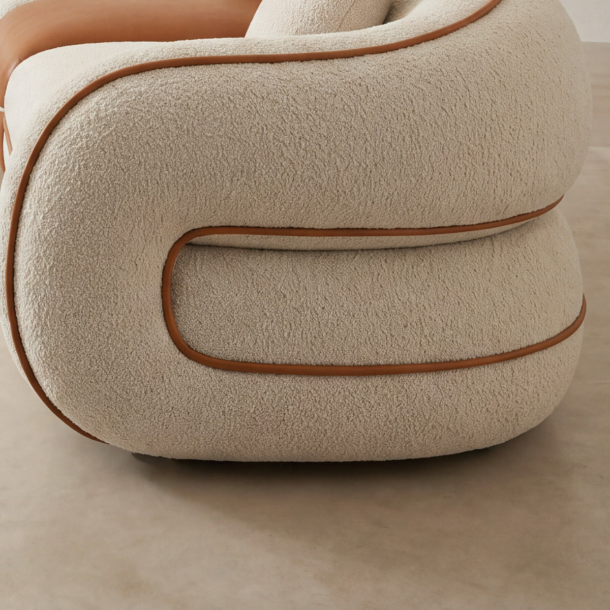 Close-up of the looped arm on the Anello sofa