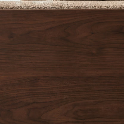 Close-up of the walnut-finish ash veneer on the Cornice sofa