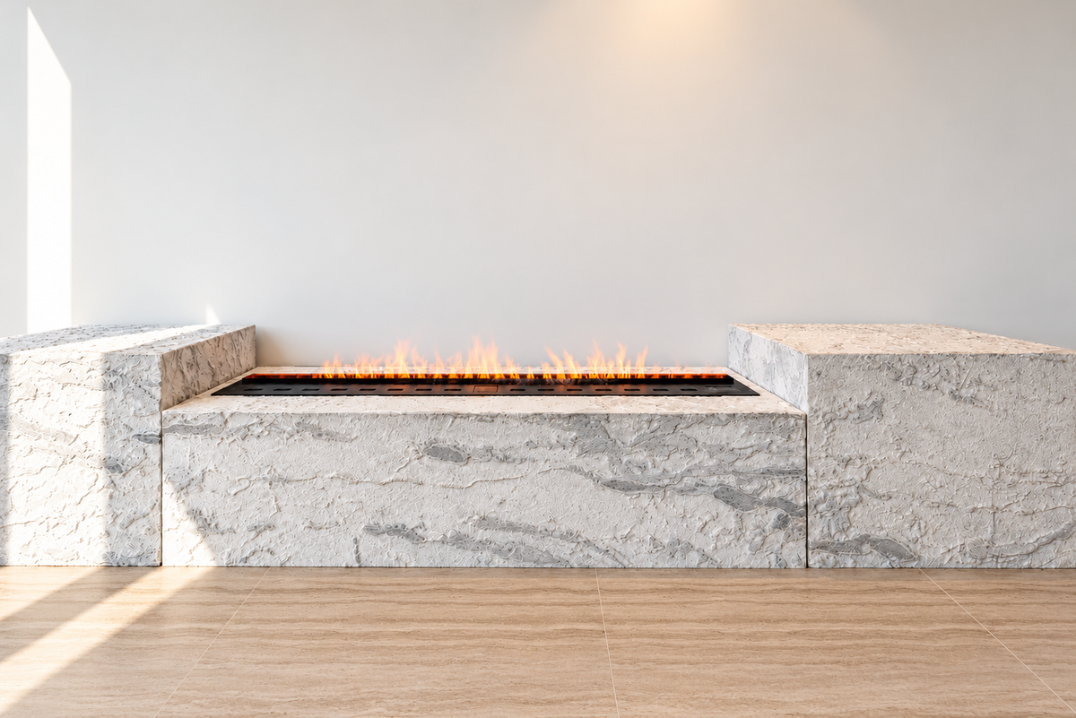 Custom fireplace in textured white stone blocks with a linear flame insert