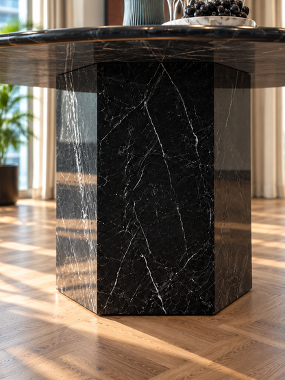 Close-up of Epico Black Marquina marble hexagonal pedestal base with natural white veining
