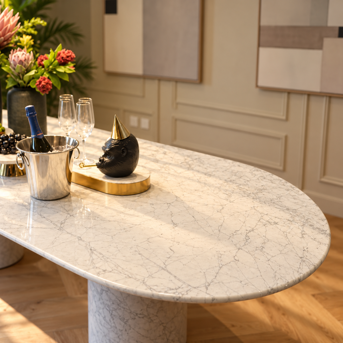 Close-up of the rounded end and grey veining on the Impero white Carrara marble oval table top