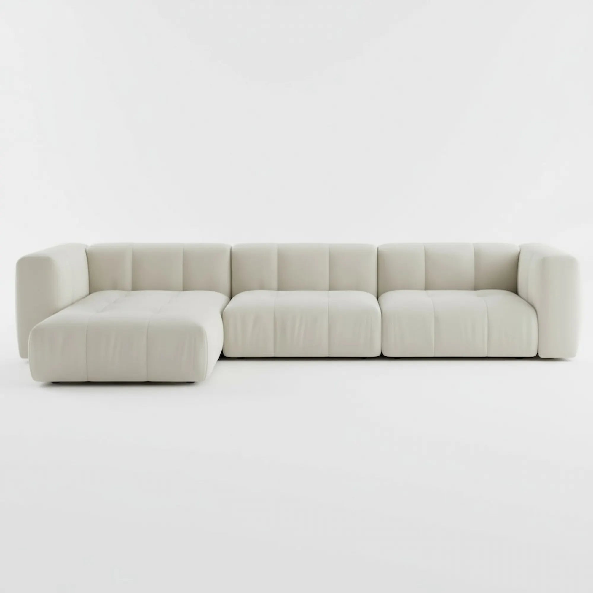Large Beige sectional sofa on a white background Casa Di Andi Dubai