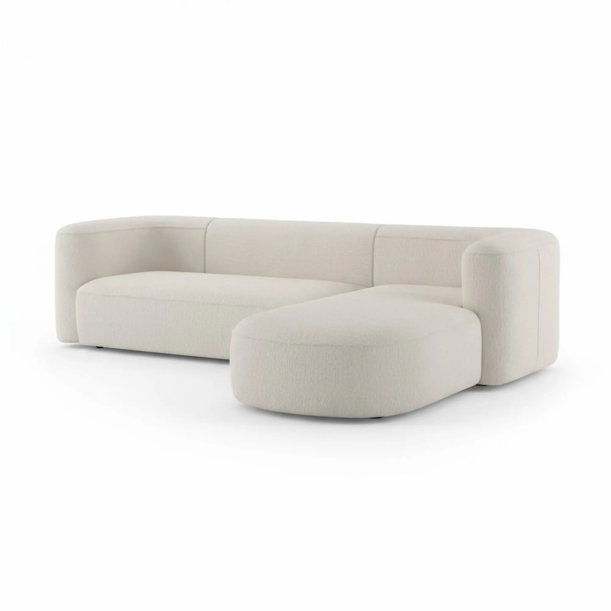 Onda L-Shape Right Modular Sofa in beige bouclé fabric on a white background — handcrafted curved design by Casa Di Andi Dubai.