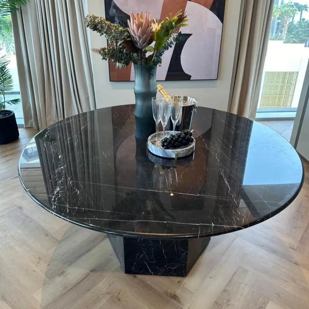 Black marble round dining table with sculptural base – Casa Di Andi Dubai