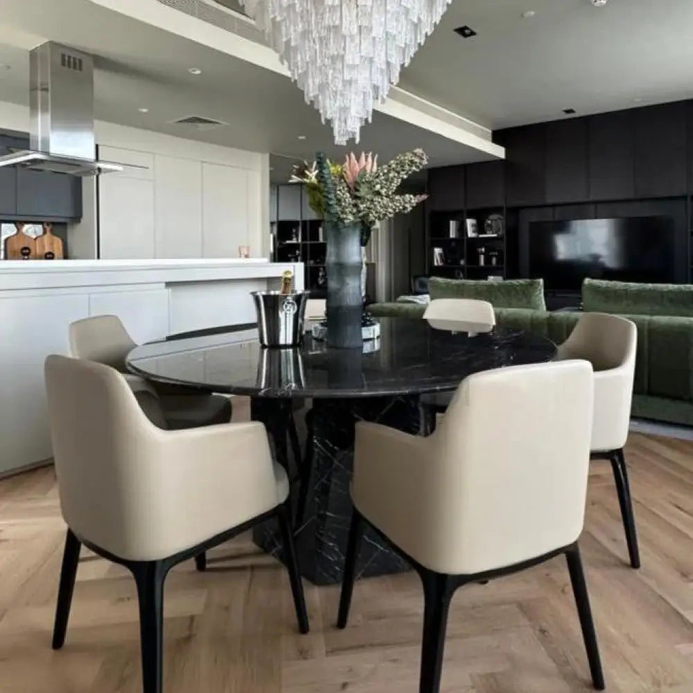 Black marble round dining table with sculptural base – Casa Di Andi Dubai