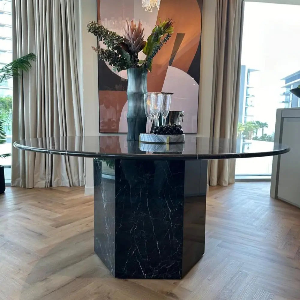 Black marble round dining table with sculptural base – Casa Di Andi Dubai