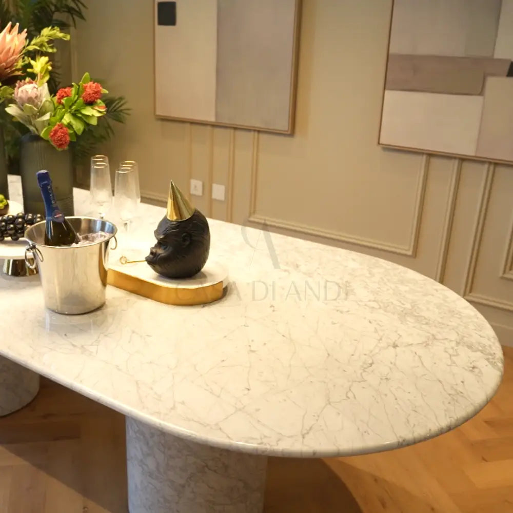 White Carrara marble oval table with dual base – Casa Di Andi Dubai