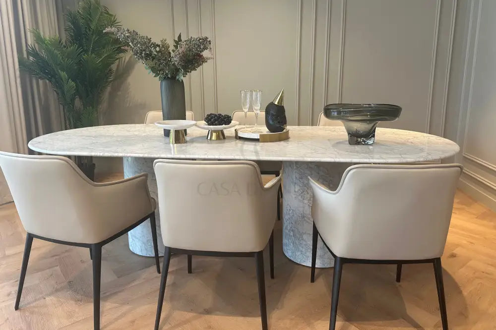 White Carrara marble oval table with dual base – Casa Di Andi Dubai
