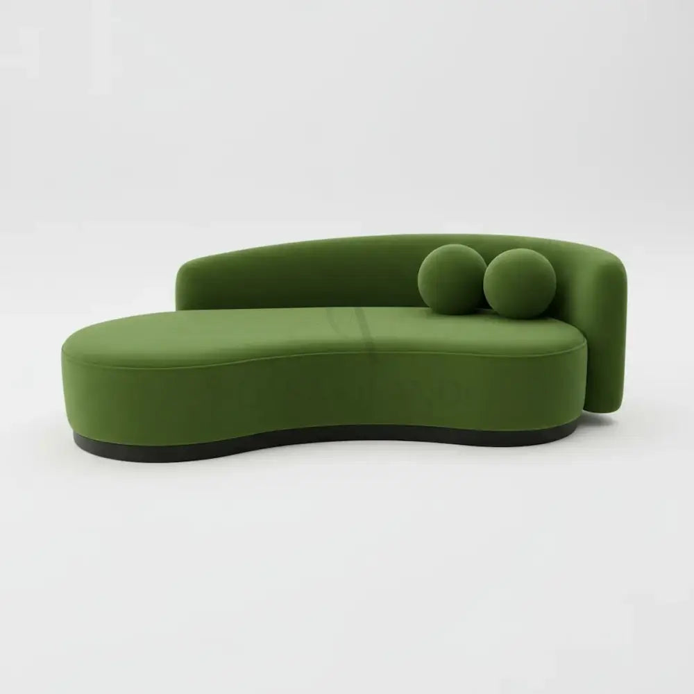 Luna curved green velvet sofa by Casa Di Andi with sculptural backrest