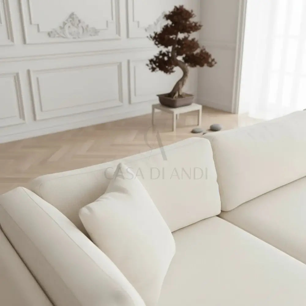 Modern L-shaped sectional sofa in ivory fabric by Casa Di Andi Essentials Dubai